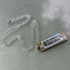 Crescendo Music Mini Harmonica On Necklace 1 Crescendo Music Mini Harmonica On Necklace